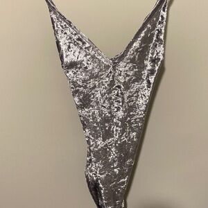 2 Brand New velour Bodysuits. One with tags